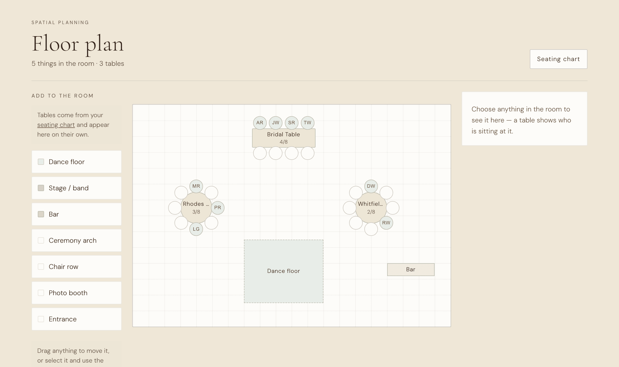 The floor plan editor: a room with named tables, chairs showing guests’ initials, a dance floor and a bar.